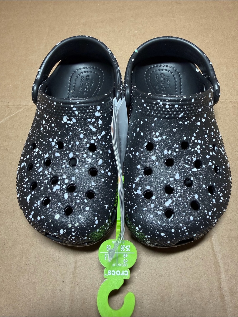 CROCS Kids' Classic Clog in Black with White Paint Splatter